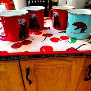 Set of 4 cups. Excellent condition; hardly used - made of tin